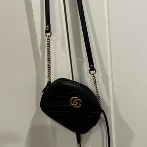 Elegant Black Crossbody Bag with Gold Accents